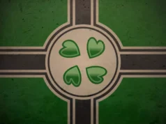 4chan lleva más de una semana fuera de línea y probablemente no volverá Ilustración de una bandera estilizada en tonos verde, negro y beige. En el centro hay un círculo con cuatro corazones verdes orientados como los pétalos de un trébol. La composición recuerda a una cruz nórdica, con líneas negras y bordes claros que se extienden horizontal y verticalmente desde el centro.