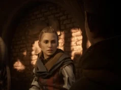 Los videojuegos calman el cuerpo después del estrés, incluso cuando los jugadores se sienten nerviosos Escena de un videojuego con ambientación medieval: una joven con expresión seria habla con otra persona en una bodega de piedra iluminada por luz cálida.